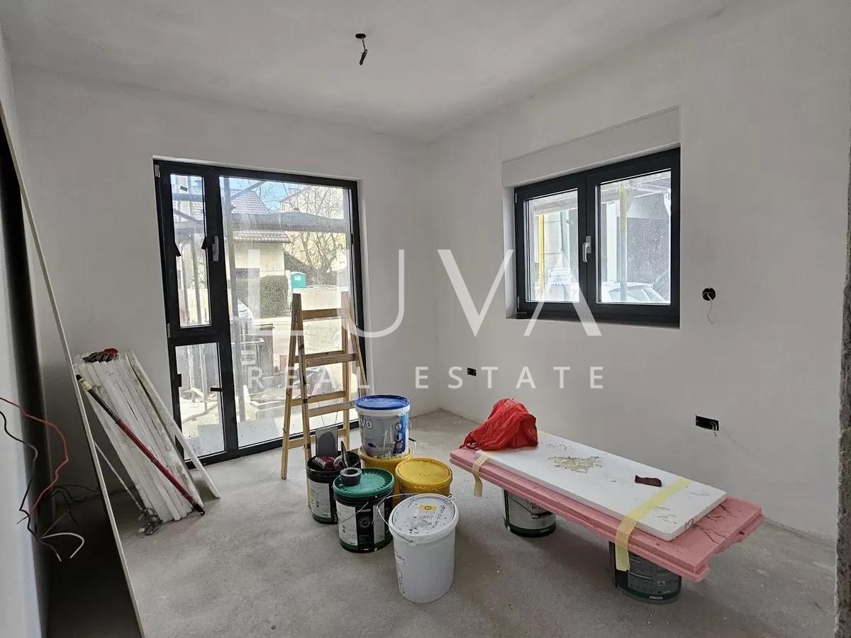 Zagreb, Trešnjevka, 3-room apt, ground floor - new build for sale